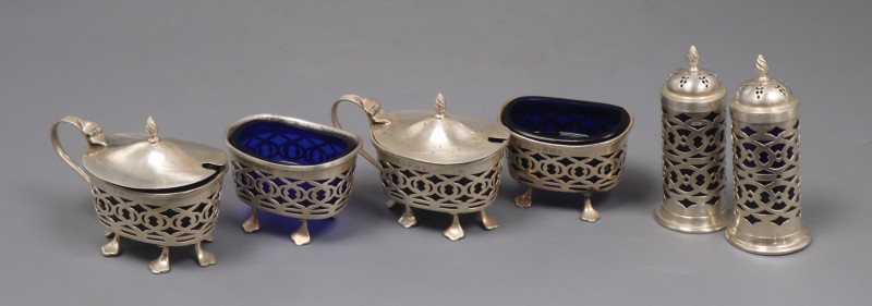 An Edwardian silver six piece condiment set, Birmingham, 1909.